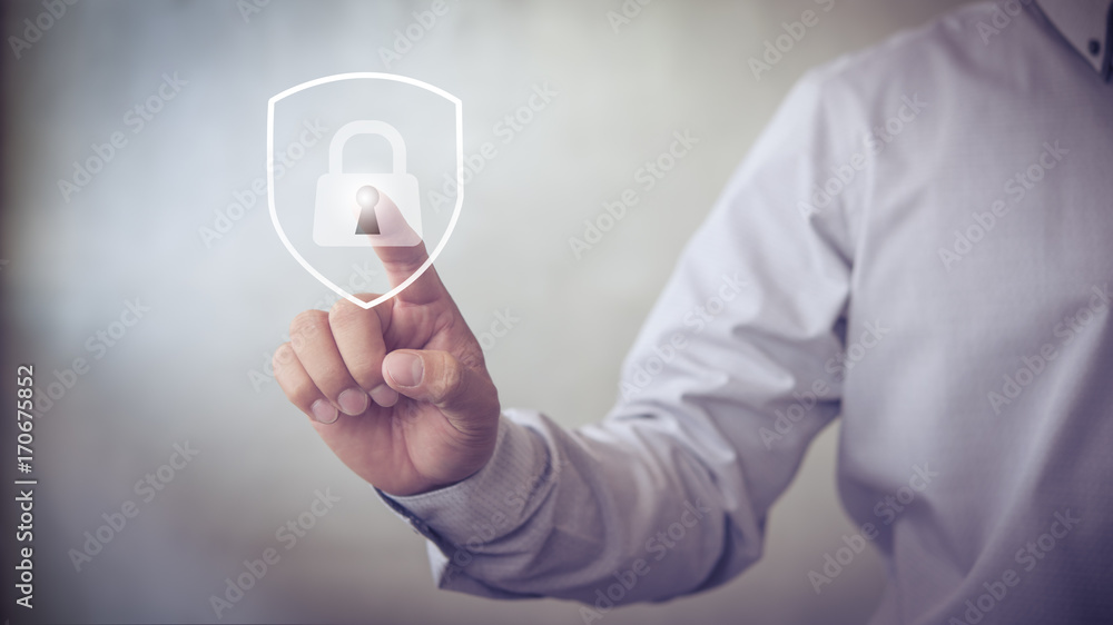 Aufkleber person touching virtual button a shield with a lock symbol, concept about security, cybersecurity an