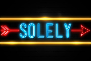 Solely  - fluorescent Neon Sign on brickwall Front view