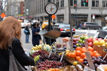 daily life, woman buying fruits in the morning