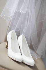 Fototapeta na wymiar Elegant wedding shoes with high heels 