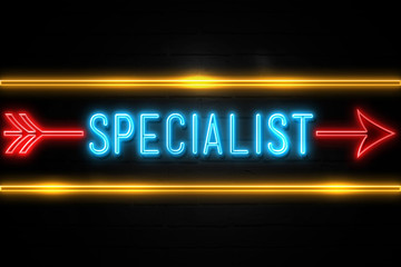 Specialist  - fluorescent Neon Sign on brickwall Front view