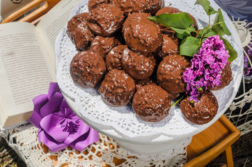 the tables with the desserts . decorated plates of cookies , biscuits. A wedding Banquet . Extra pounds and calories . Sweets of various kinds