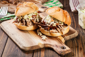 Homemade pulled pork burger with coleslaw salad