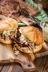 Homemade pulled pork burger with coleslaw salad