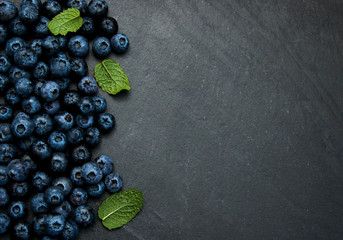 Fresh blueberries on a stone background