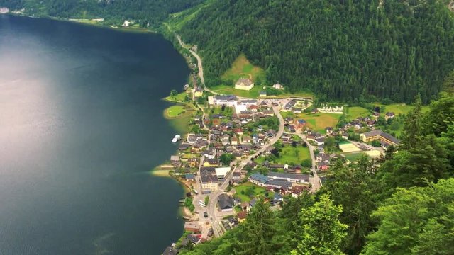 Hallstatt village with lake and trees - aerial shot 