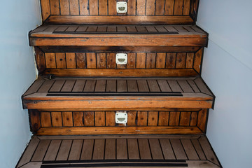 Wooden staircase on modern yacht