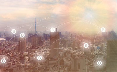 Fototapeta na wymiar Blockchain and Bitcoin concept : Cityscape with bitcoin symbols connecting altogether.