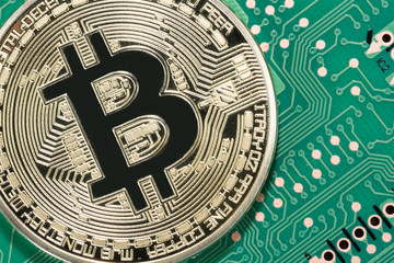 Abstract,Golden Bitcoin money on computer.