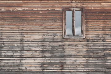 Old wooden wall with window