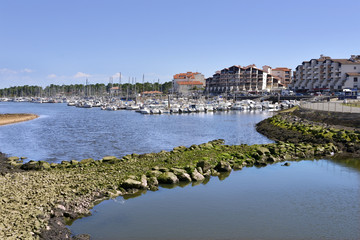 Port and town of Capbreton, a commune in the Landes department in Nouvelle-Aquitaine in southwestern France. - obrazy, fototapety, plakaty