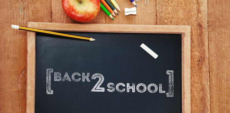 Composite image of back to school text over white background