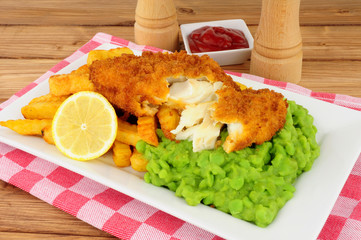 Fish and chips meal with mushy peas