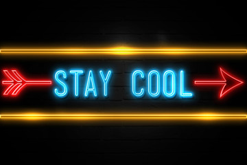 Stay Cool  - fluorescent Neon Sign on brickwall Front view