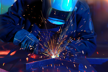 Welder erecting technical steel