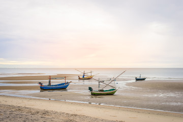 Old wooden fishing boat on the Hua Hin beach