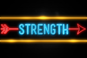 Obraz premium Strength - fluorescent Neon Sign on brickwall Front view