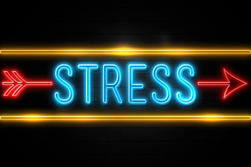 Stress  - fluorescent Neon Sign on brickwall Front view