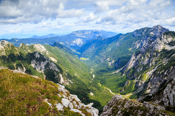 Fototapeta na wymiar Slovenia, Kamnik-Savinja Alps. View from Kamniško Sedlo in the Logarska Dolina. 21.08.2017.
