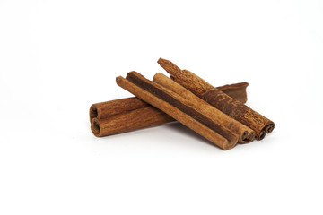 Closeup view of cinnamon stick isolated on white background