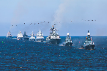 A line of modern russian military naval battleships warships in the row, northern fleet and baltic...
