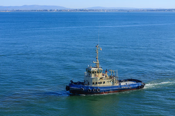 Obraz premium Tugboat off Portugal Coast