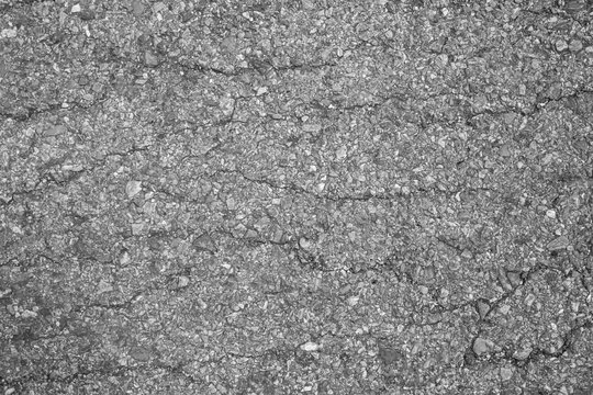 Asphalt background texture with some fine grain with road