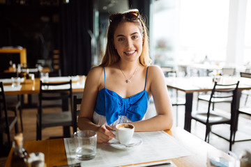 Stunning woman enjoying her coffee