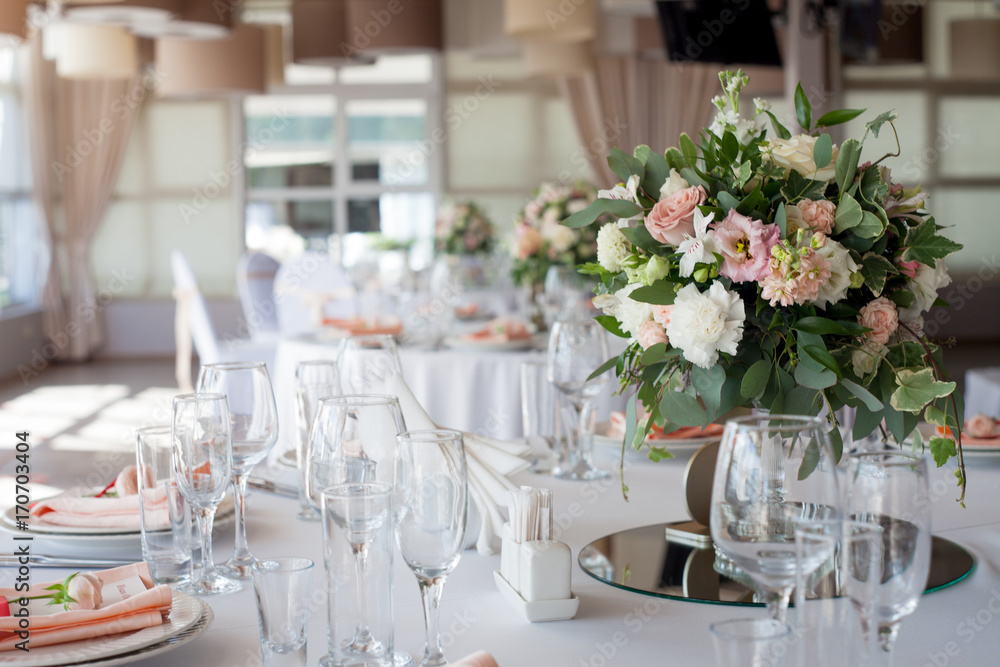 Wall mural wedding decor. flowers in the restaurant, table setting