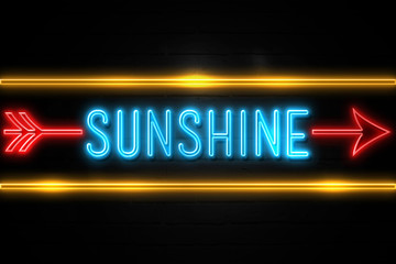 Obraz premium Sunshine - fluorescent Neon Sign on brickwall Front view