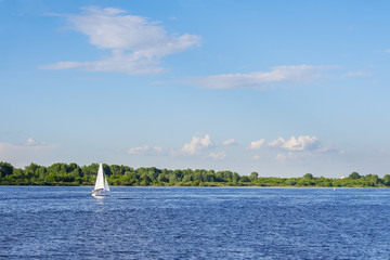 White sailboat on the water