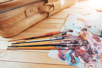 colorful paint palette with brushes