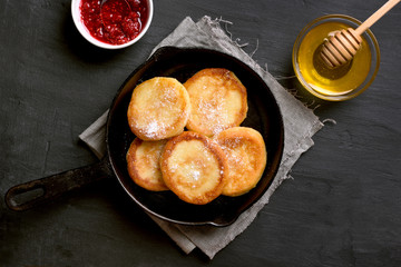 Fritters, curd cheese pancakes