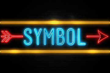 Symbol  - fluorescent Neon Sign on brickwall Front view