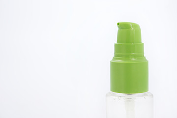 spray bottle with green lid