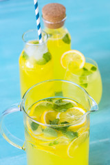 Lemon juice on a blue background