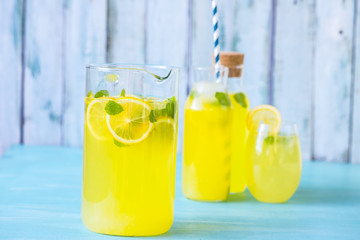 Lemon juice on a blue background