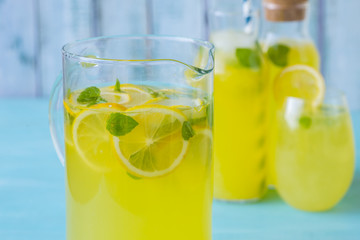 Lemon juice on a blue background