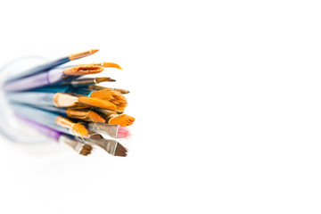 Paint brushes isolated, used artist tools with copy space