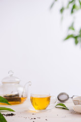 Cups of tea on wooden table background