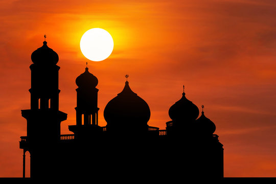 silhouette mosque or masjid dome on sunset time background 