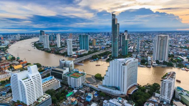 Aerial Bangkok Citysacpe And Chao Phraya River Of Bangkok, Thailand 4K Time Lapse (pan right)