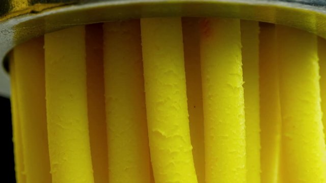 Grinder grinds the abstract paste
