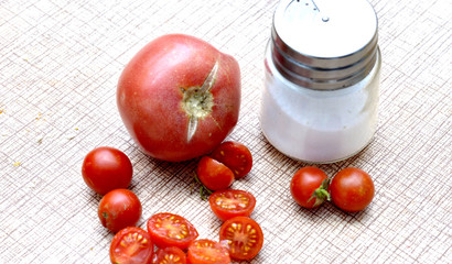 fresh harvested organic tomatoes  on a kitchen table