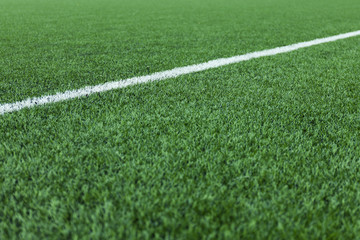 Football or soccer stadium grass white line