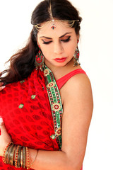 Woman dancing Indian dance in national dress. A handsome beautiful girl portrait in red Hindu...