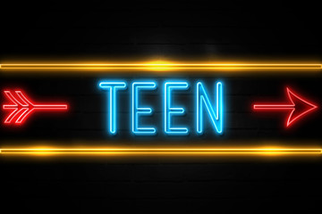 Teen  - fluorescent Neon Sign on brickwall Front view