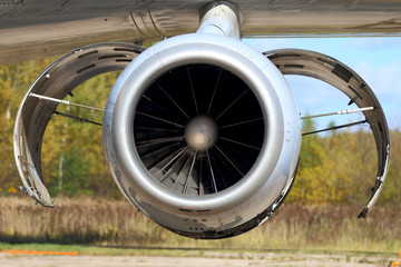 Jet airplane engine with opened covers