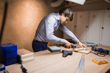 Handyman working with wood