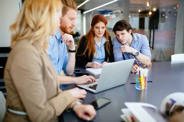 Businesspeople working in office